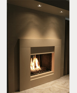An image of a fireplace with a fire in it, surrounded by panel walls.