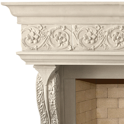 A white Italian fireplace mantel with ornate carvings.