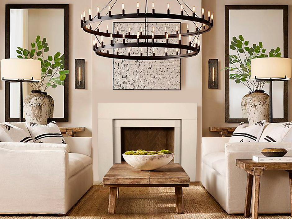 An elemental living room with white furniture and a chandelier.