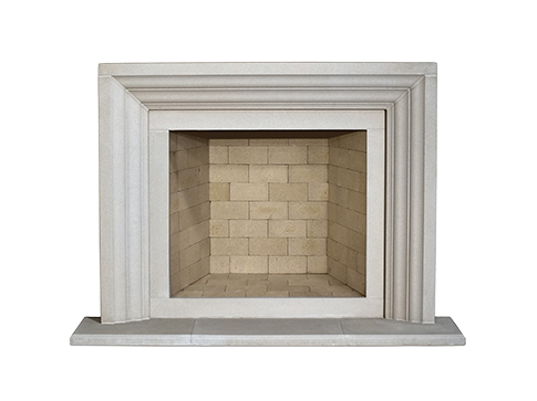 A white fireplace with a brick surround, one of our favorites.