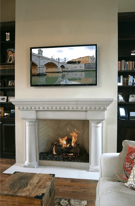 Italian living room with a fireplace and a tv above it.