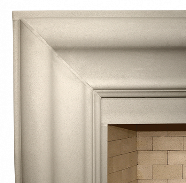 A close up of a transitional fireplace with a brick surround.