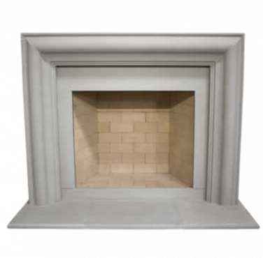 A white fireplace with a brick surround, perfect for cozying up and enjoying your favorite book on a fast-approaching winter night.